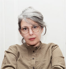 Headshot of María A. Cabrera Arús